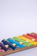 Rainbow Xylophone Or Glockenspiel with white isolated object. Rainbow Xylophone background.