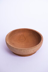 natural brown Wooden bowl with isolated object.