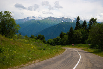 Beautiful mountain landscape in early spring and bad road.