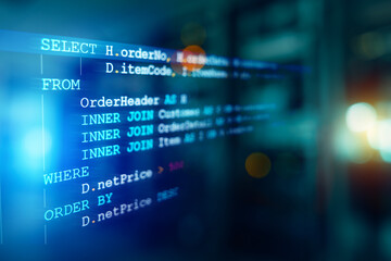 Developer or Programmer's text editor showing SQL Structured Query Language code on computer...