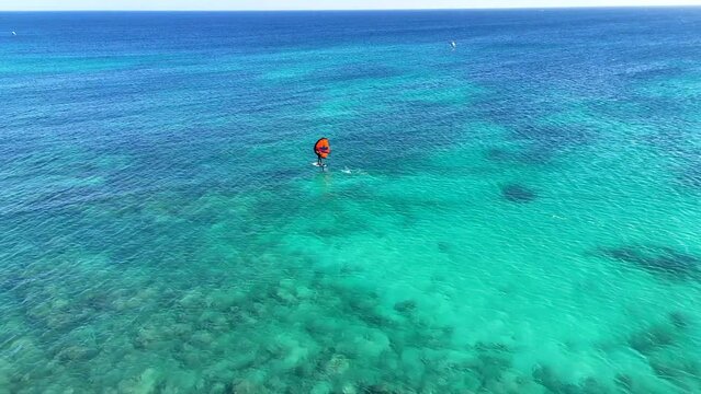 Following a wing foiler near, in the sea of Santa Maria, Sal, Cape Verden
