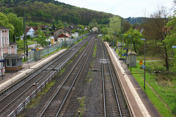 Image of a small railway station in Germany view and a road bridge.