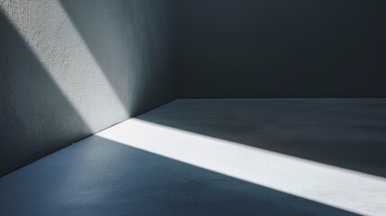 A striking play of light casting a geometric shadow on a textured wall, evoking a sense of calm and contemplation.
