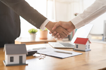 Real estate, success deal asian young woman handshake or shaking hand with landlord realtor, client male after buyer man signed rental, lease contract. Banker agreement mortgage loan, property lease. - obrazy, fototapety, plakaty