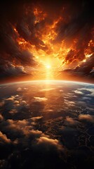 Obraz premium A view of Earth from space showing a sunrise or sunset over a highly detailed and textured landscape.