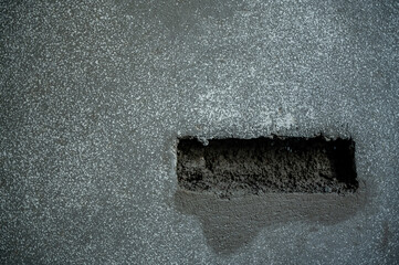 Box made in the cement concrete wall for electrical switches of concealed wire fitting during construction of new home.