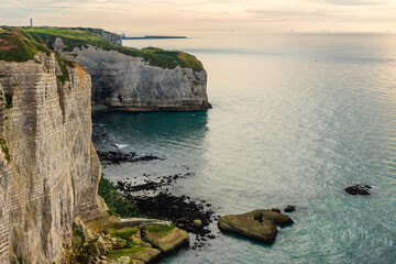 White chalk natural cliffs in Etretat, Normandy, France. French sea coast in Normandie with famous...