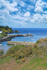 Sauzon in Belle-Ile, Brittany, the typical harbor with boats and lighthouse
