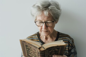 Elderly Woman Reading Book With Glasses