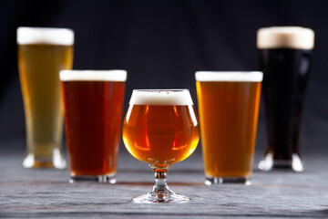 Collection of beers in different styled glassware