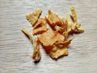Snacks sistik on wooden background.