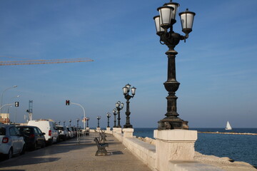 Fototapeta na wymiar Embankment promenade Imperatore Augusto with street light and view of Adriatic sea in the city of Bari, Puglia, Southern Italy.