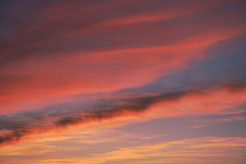 A sunset. Heaven, orange sky Sun rays Wallpaper