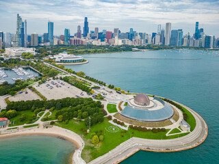 Sunny aerial view of the Adler Planetarium and downtown cityscape