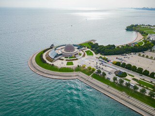 Sunny aerial view of the Adler Planetarium and downtown cityscape