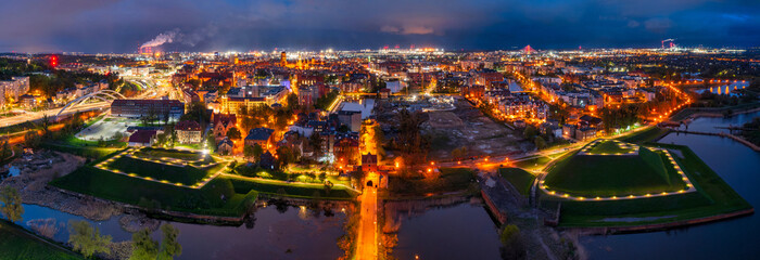 Panorama of Gdansk with the 17th-century fortifications illuminated at night. Poland