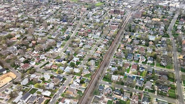 Beautiful view from the airplane window during landing at New York airport onto the architecture of suburban neighborhoods.