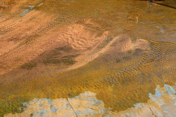The color of water in the Mediterranean Sea in shallow water. Natural abstract background.