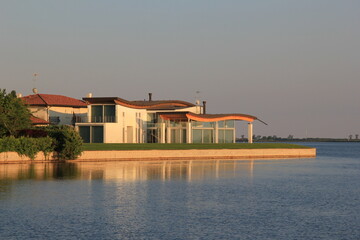 house on the river albarella, italy