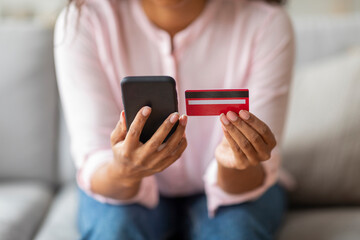 Cropped of Woman with Credit Card Making Online Purchase