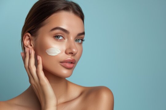 Woman in studio with acne, anti-aging, or dermatological cream, sunscreen, or mockup. Relax, product, and model with facial lotion, natural makeup, or foundation.