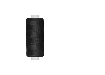 black spool of sewing thread isolated on white background close up