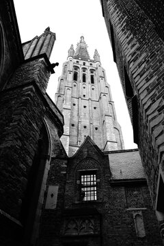 Spire of the Church of our Lady in Bruges, Belgium - black-and-white image