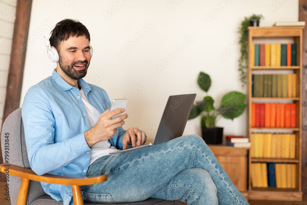 Aufkleber man sitting in chair using laptop computer