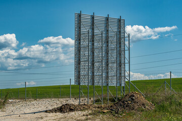 Industrial Horizon. Metal Board Construction by the Road.