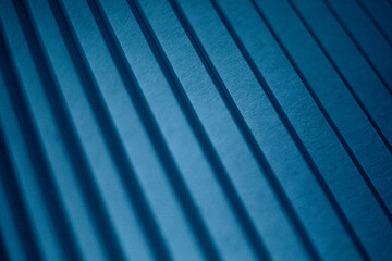Abstract Blue Background With Diagonal Shadow Lines During Evening. With Photo Film Grain.