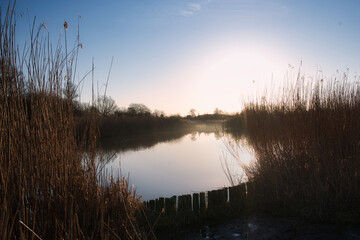 Teich beim Sonnenaufgang im Brenner Moor bei Bad Oldesloe, Deustchalnd