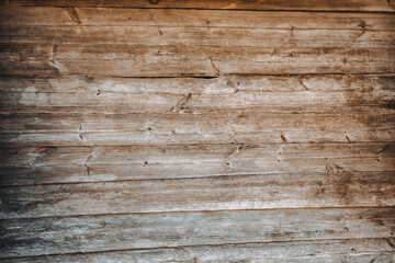 Brown wooden background. Wood texture. It's an aged logs wall. Rustic style. Weathered board. Striped banner. Natural material