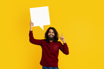 Man With Long Hair and Beard Holding Speech Bubble