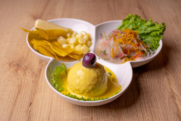 Peruvian food, seafood trio. on wooden table.