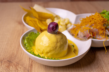 Peruvian food, seafood trio. on wooden table.