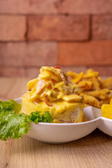 Peruvian food, seafood trio. on wooden table.
