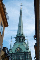 German or St. Gertrude Church Tower, Tyska Kyrkan in Gamla Stan Old Town Stockholm Sweden. Vertical