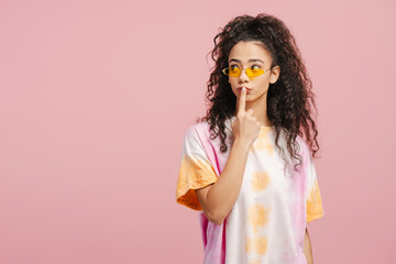 Attractive, pensive girl, teenager thinking looking away at copy space, standing isolated