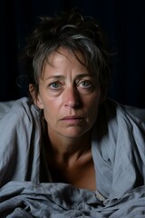 Obraz premium A portrait of a woman with green eyes and dark hair