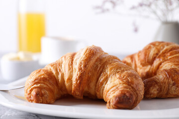 Tasty breakfast. Fresh croissants on table, closeup