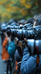 Photographers with long focus lenses