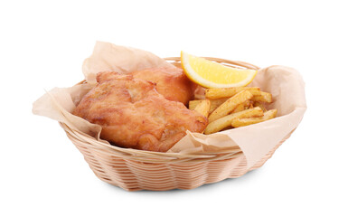 Tasty fish, chips and lemon in wicker bowl isolated on white