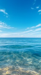 Blue ocean with white clouds in the sky