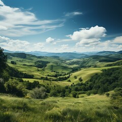 Naklejka premium idyllic green rolling hills landscape with blue sky and white clouds