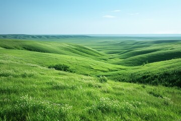 Naklejka premium Green rolling hills under blue sky