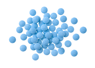 Heap of blue tablets isolated on a transparent background. Top view. Stock photo.