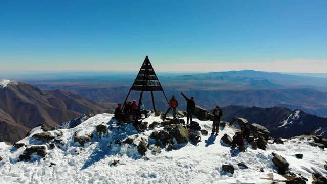Aerial drone view in 4K of summit of Mount Toubkal in the Atlas Mountains, Morocco - CIRCA 2021