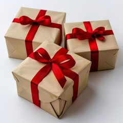 Obraz premium Three Brown Boxes With Red Ribbons