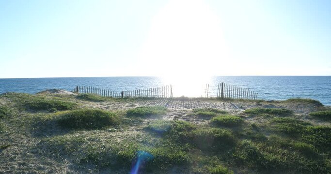 The coast at Pen Bron and the blue water of the Atlantic ocean. La Turballe, France - April 28, 2024.