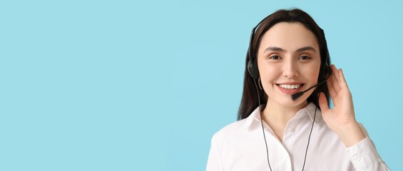 Female technical support agent in headset on blue background with space for text